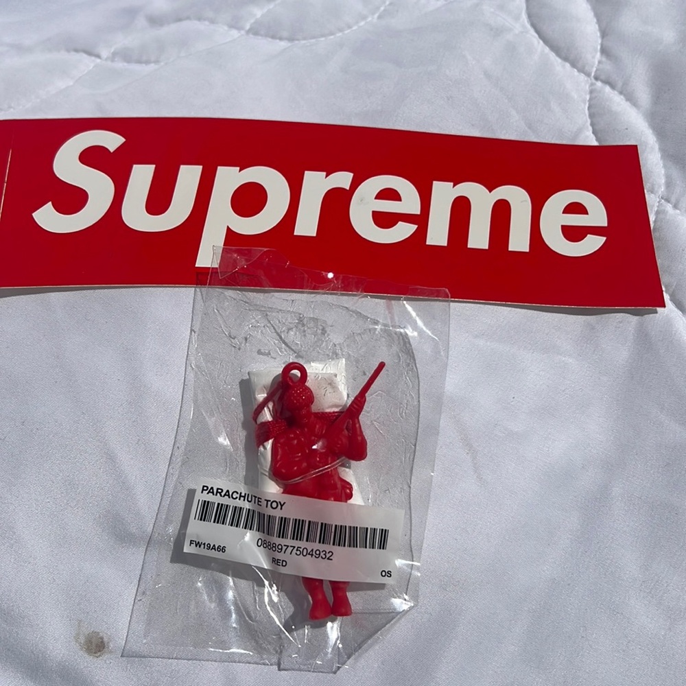 Supreme parachute toy & Supreme sticker